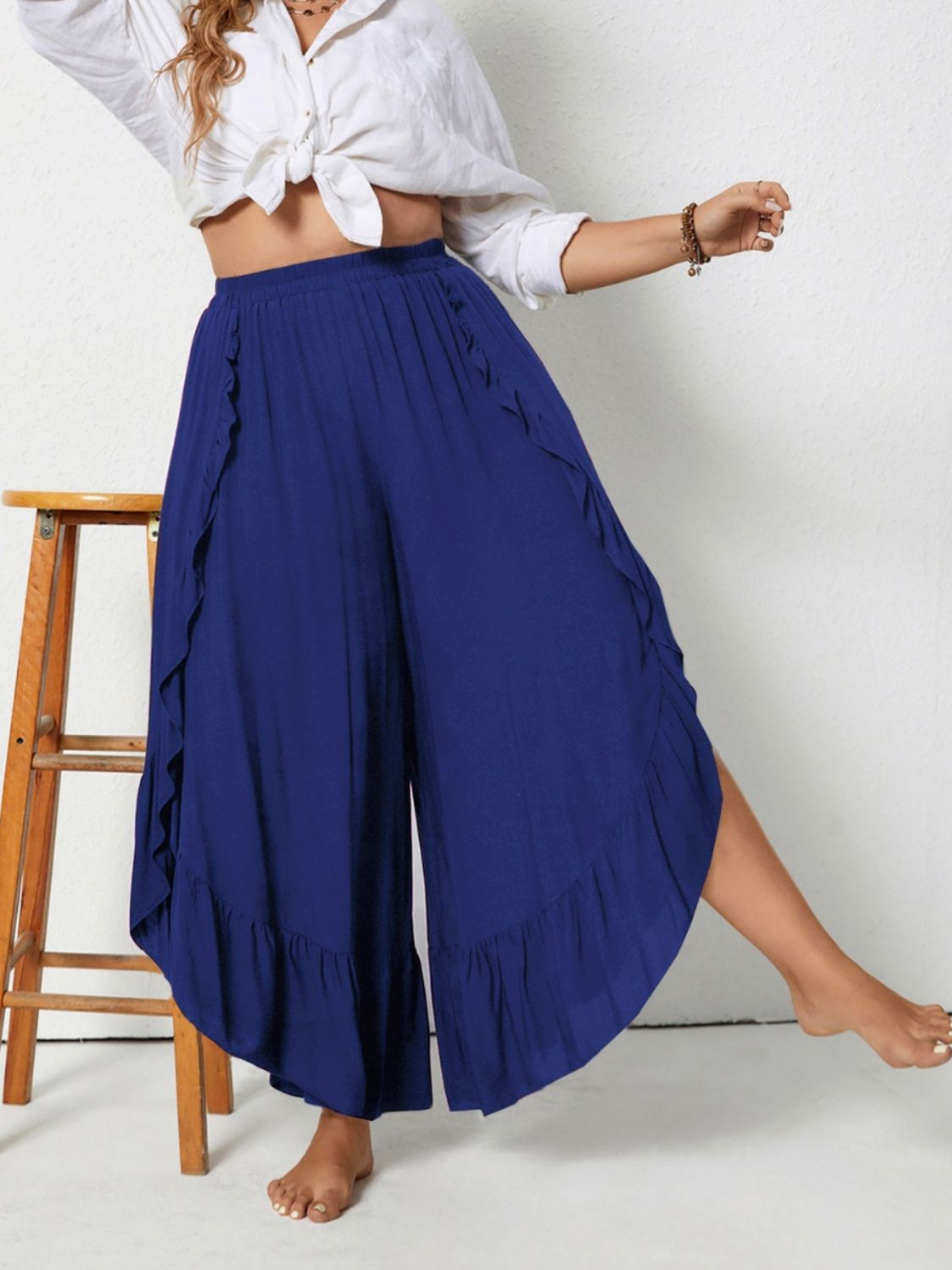 Plus size ruffled wide leg pants with slit, opaque.