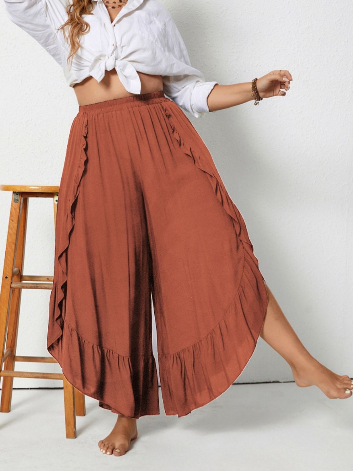 Plus size ruffled wide leg pants with slit, opaque.