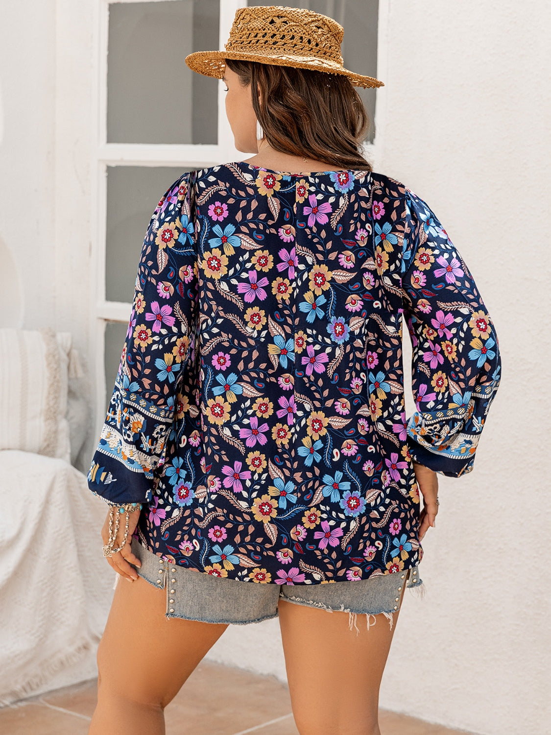 Plus Size Tie Neck Tassel Printed Blouse with Decorative Button.