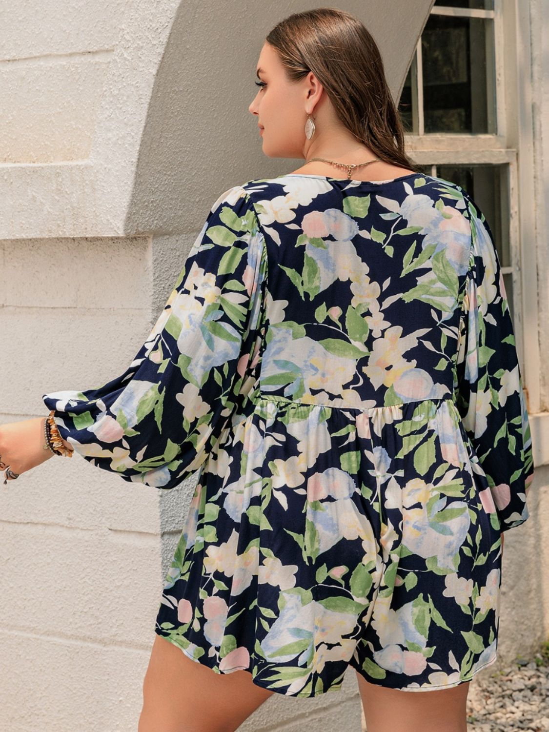 Plus Size Tied Printed Long Sleeve Romper with Decorative Button.
