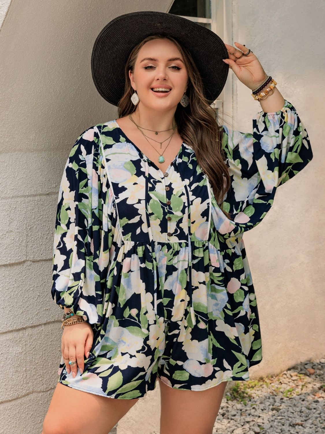 Plus Size Tied Printed Long Sleeve Romper with Decorative Button.