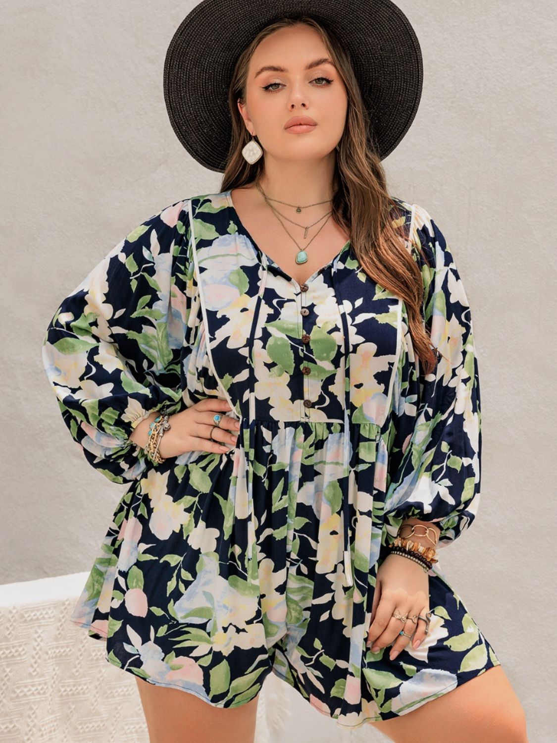 Plus Size Tied Printed Long Sleeve Romper with Decorative Button.
