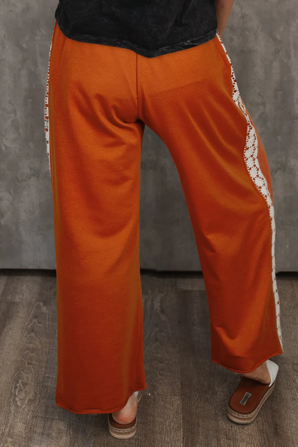 Plus size wide leg pants with tie, opaque.