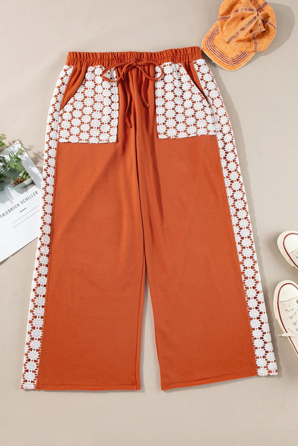 Plus size wide leg pants with tie, opaque.