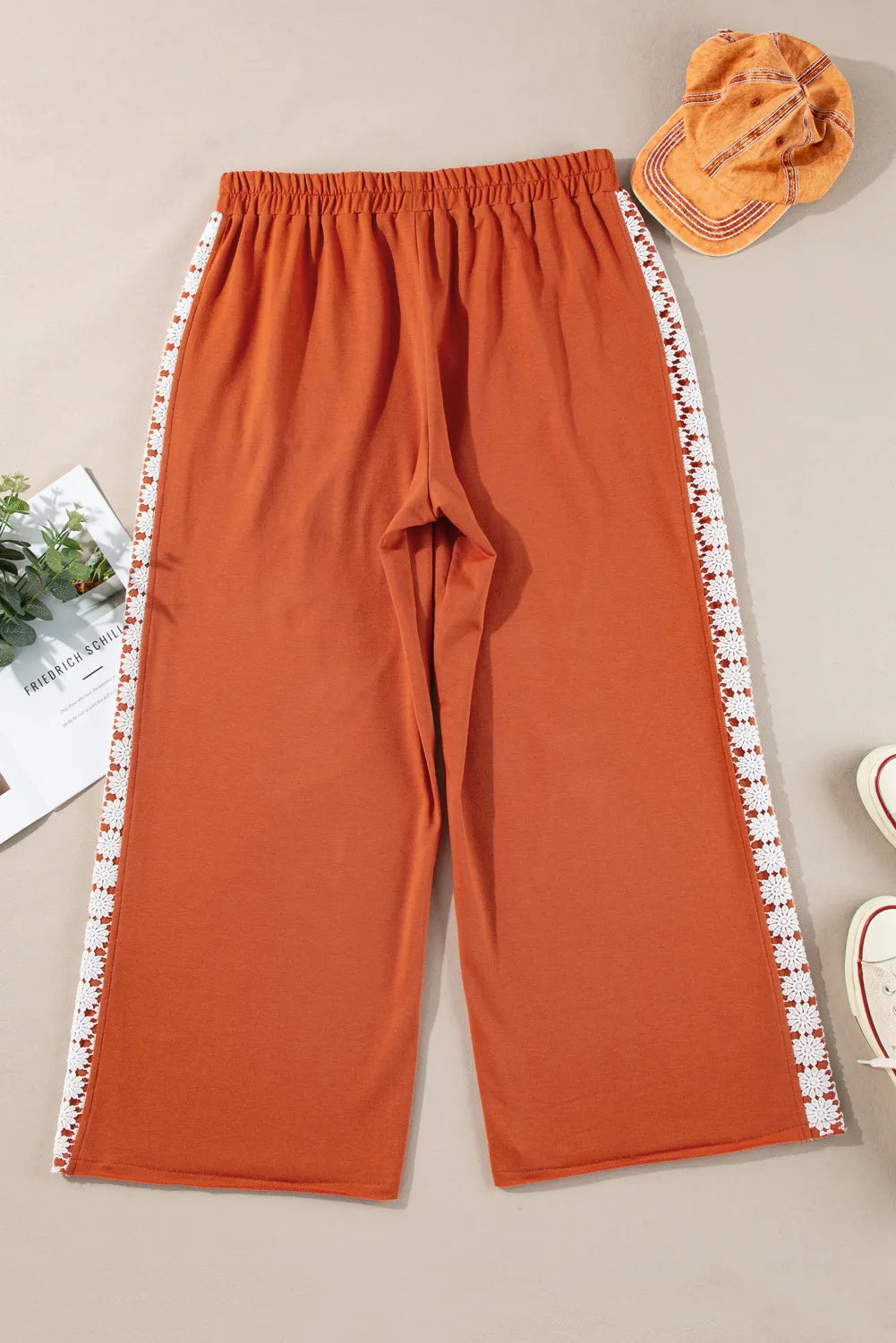 Plus size wide leg pants with tie, opaque.