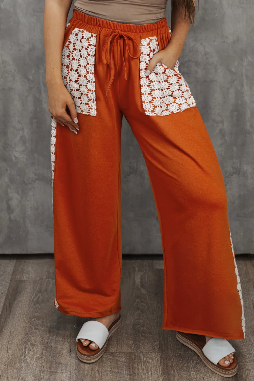 Plus size wide leg pants with tie, opaque.