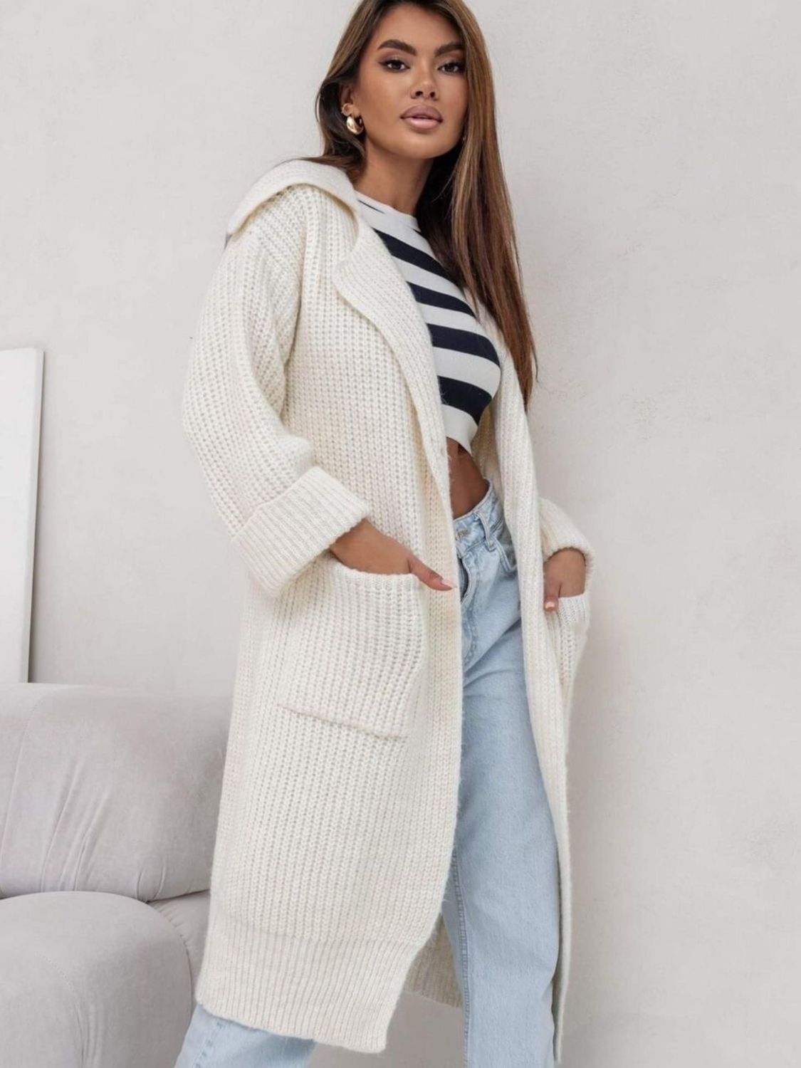 Pocketed collared neck dropped shoulder cardigan.