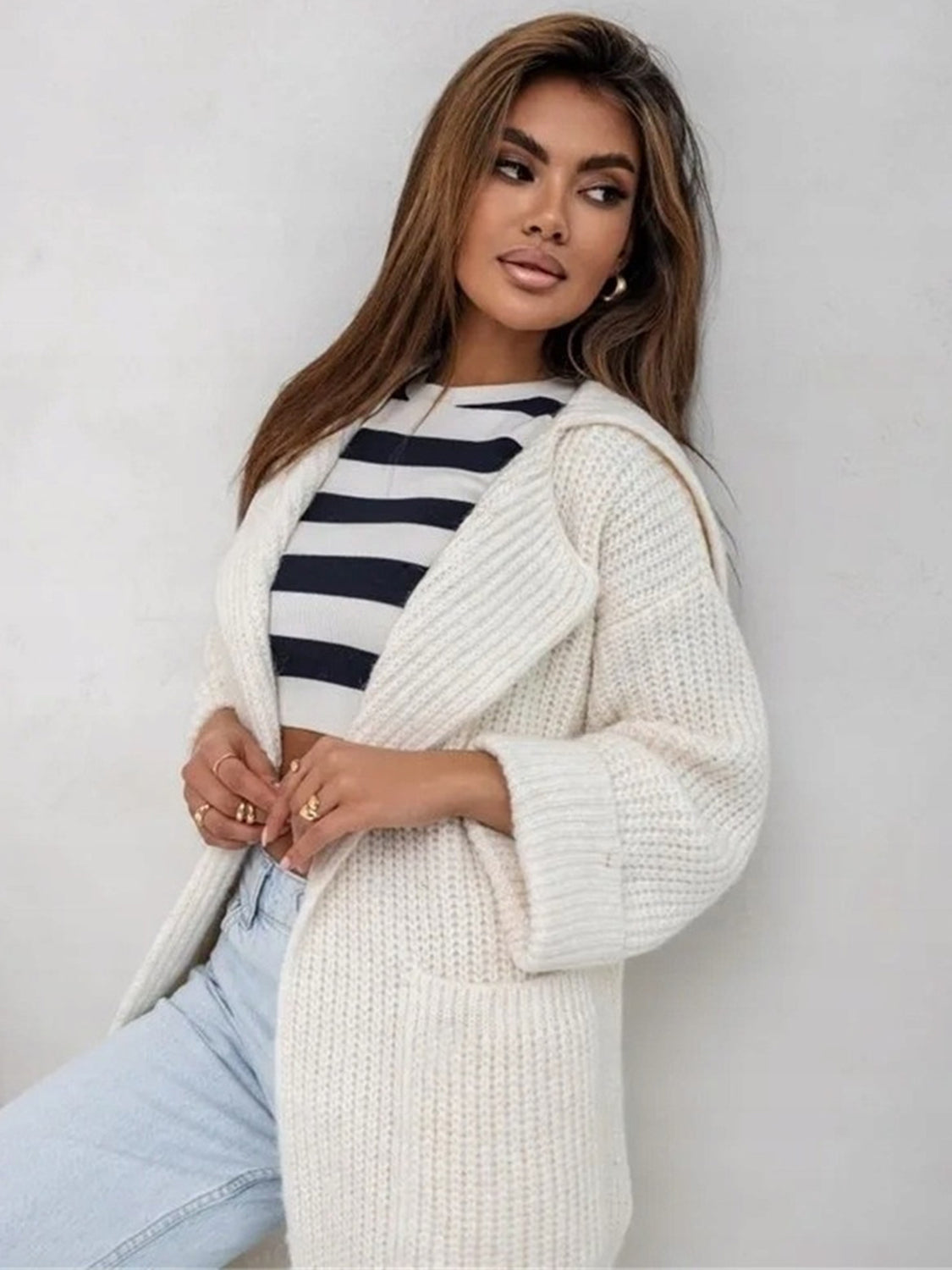 Pocketed collared neck dropped shoulder cardigan.