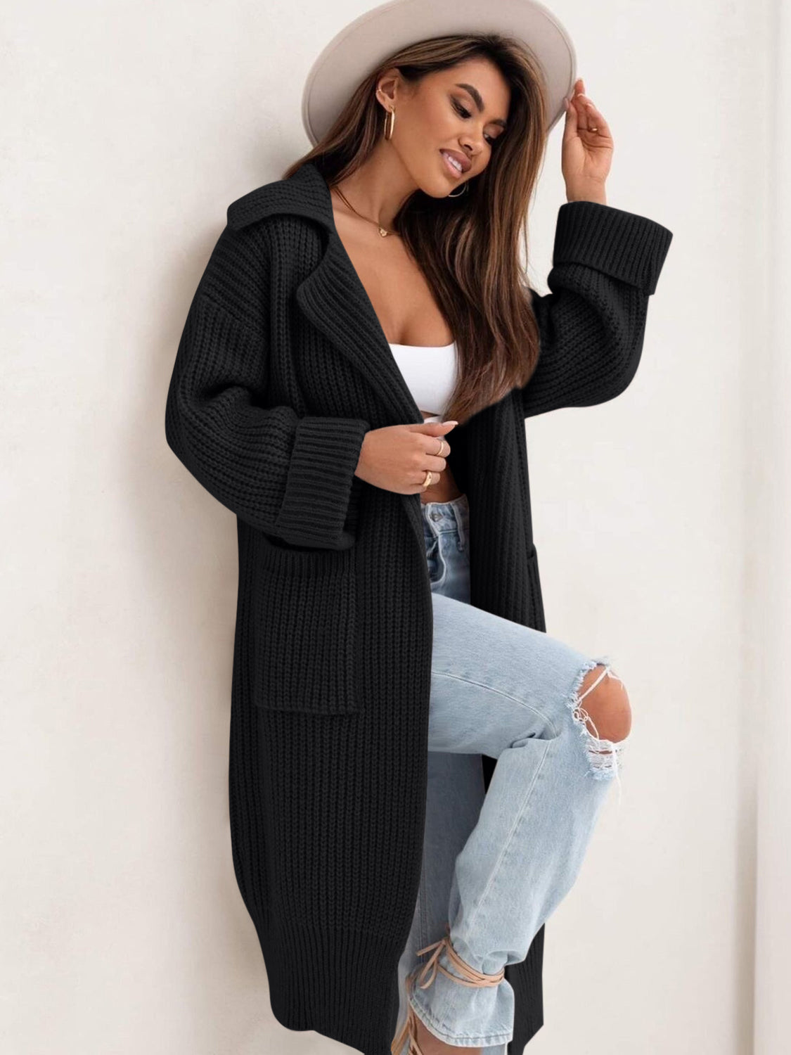 Pocketed collared neck dropped shoulder cardigan.