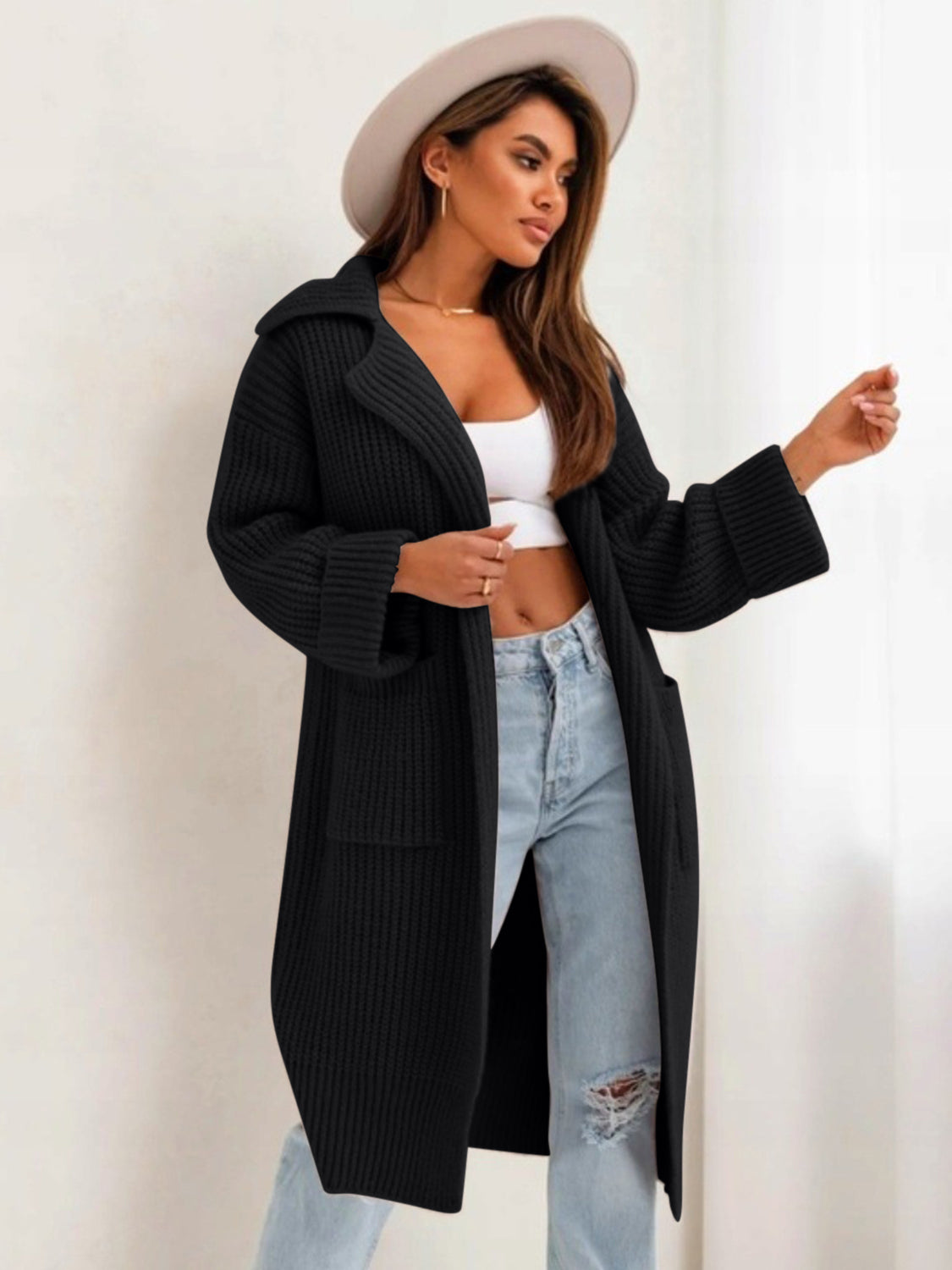 Pocketed collared neck dropped shoulder cardigan.
