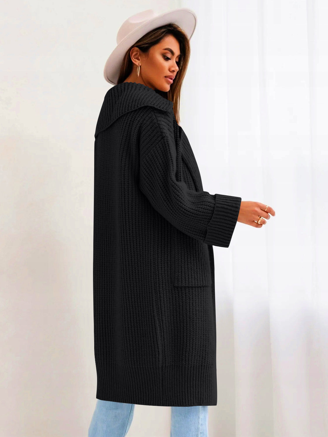 Pocketed collared neck dropped shoulder cardigan.