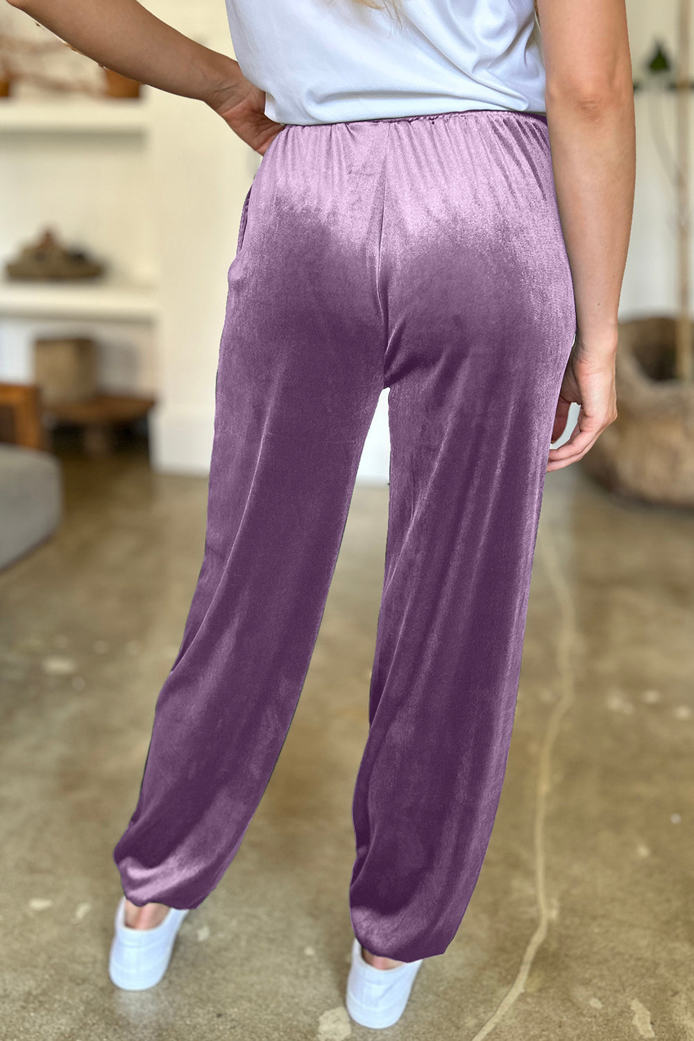Pocketed elastic waist joggers, opaque.