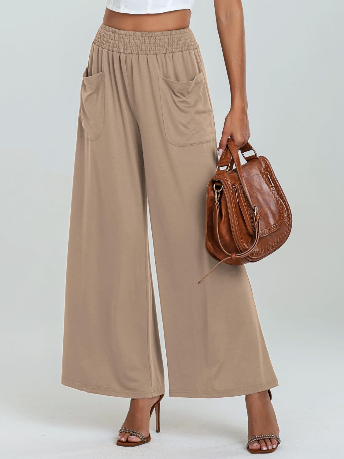Pocketed elastic waist wide leg pants, opaque.