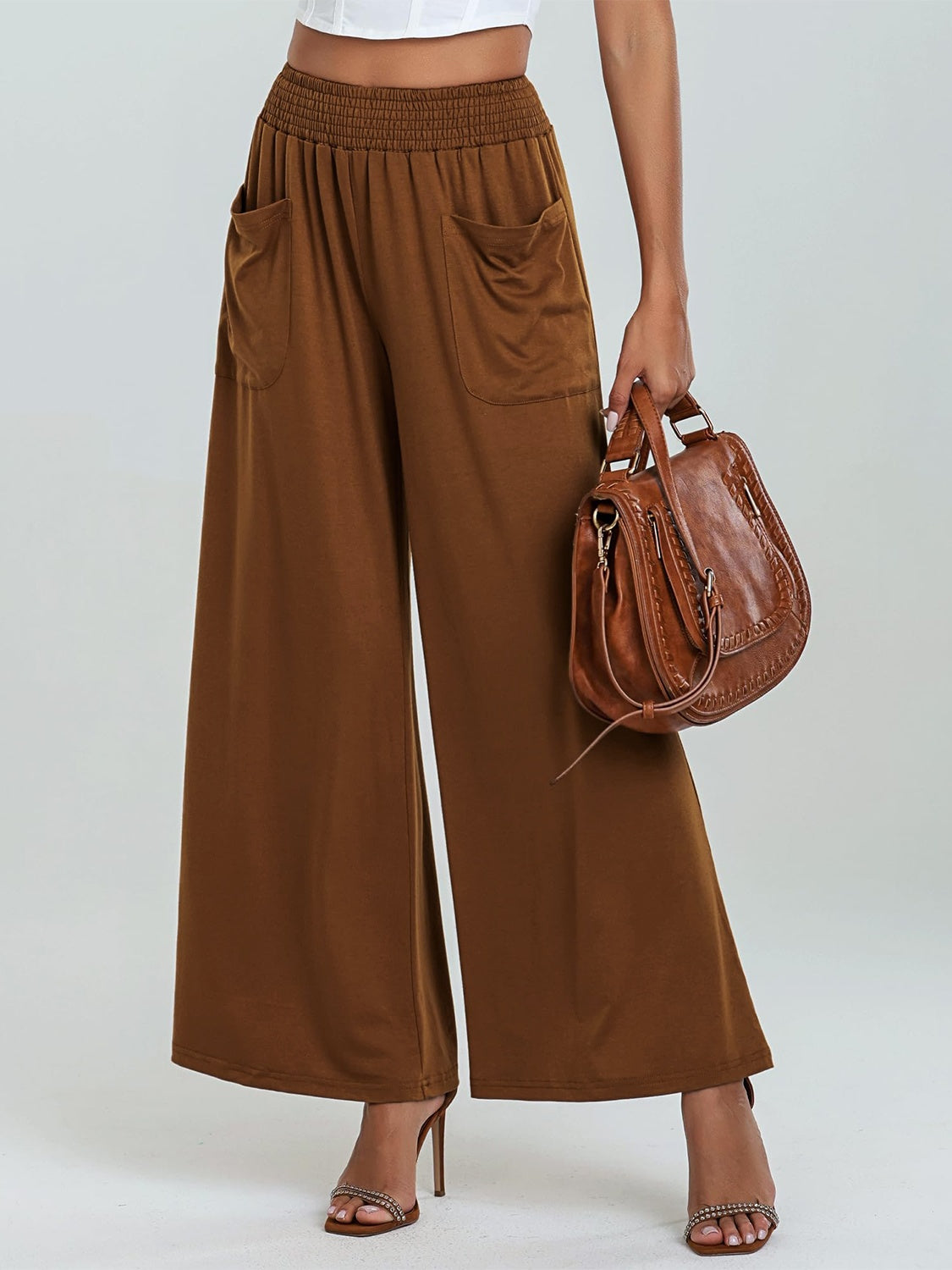 Pocketed elastic waist wide leg pants, opaque.