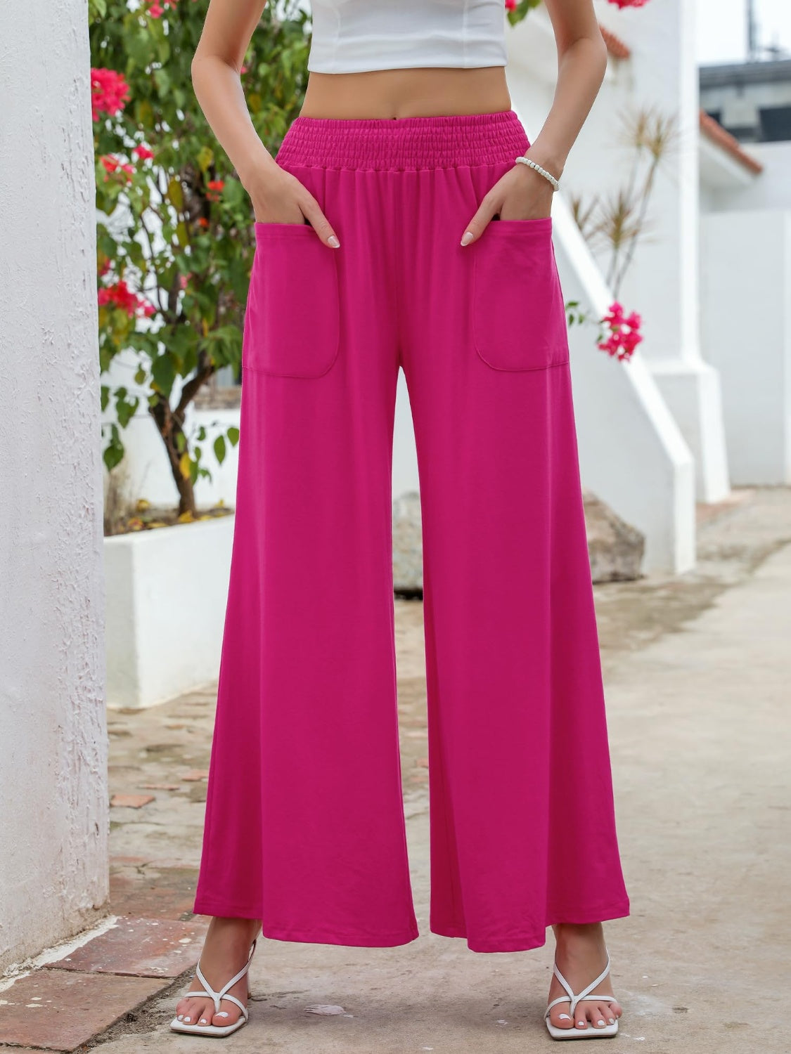 Pocketed elastic waist wide leg pants, opaque.
