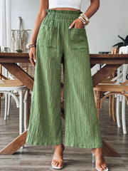Pocketed elastic waist wide leg pants, opaque.