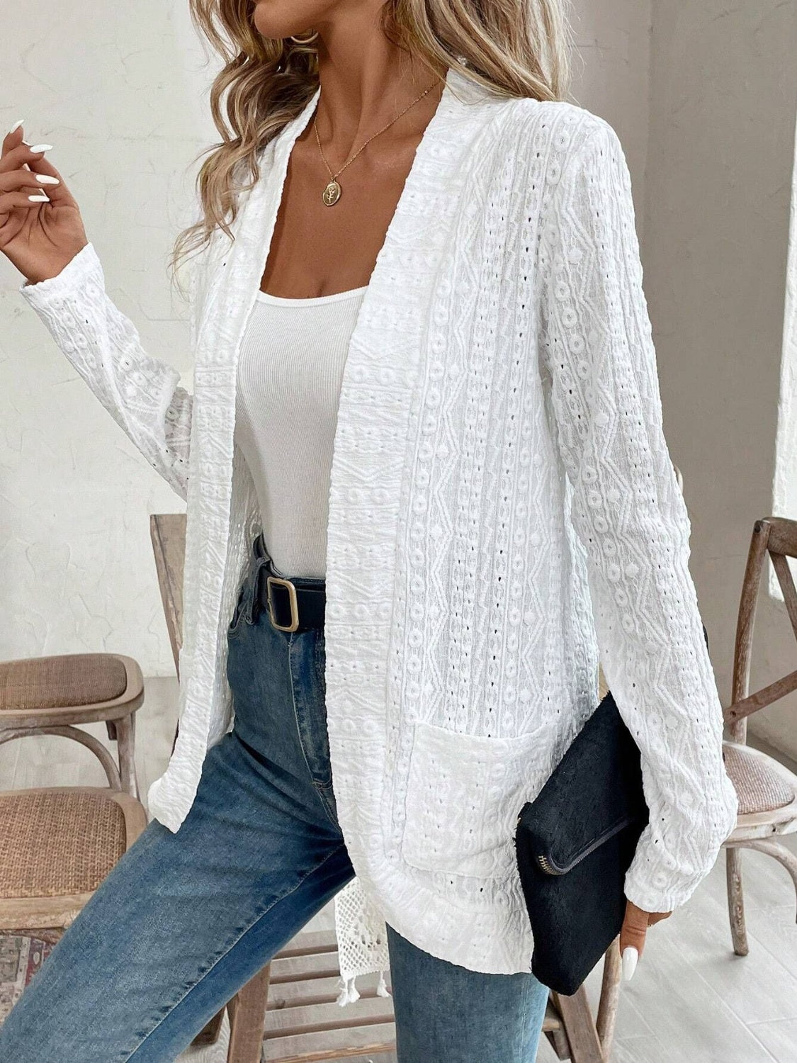 Pocketed eyelet open front cover up.