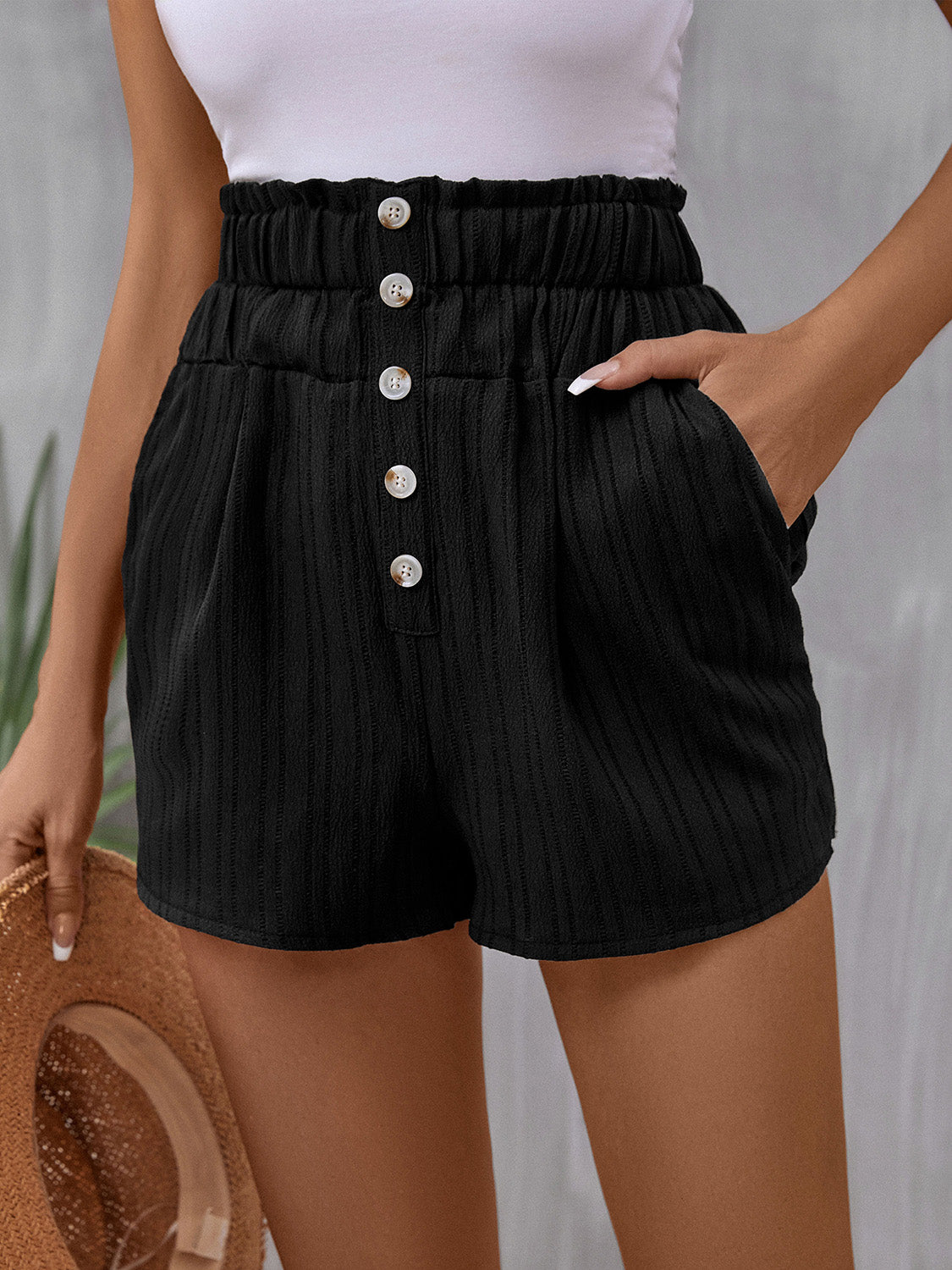 Solid drawstring smocked waist pocketed shorts.