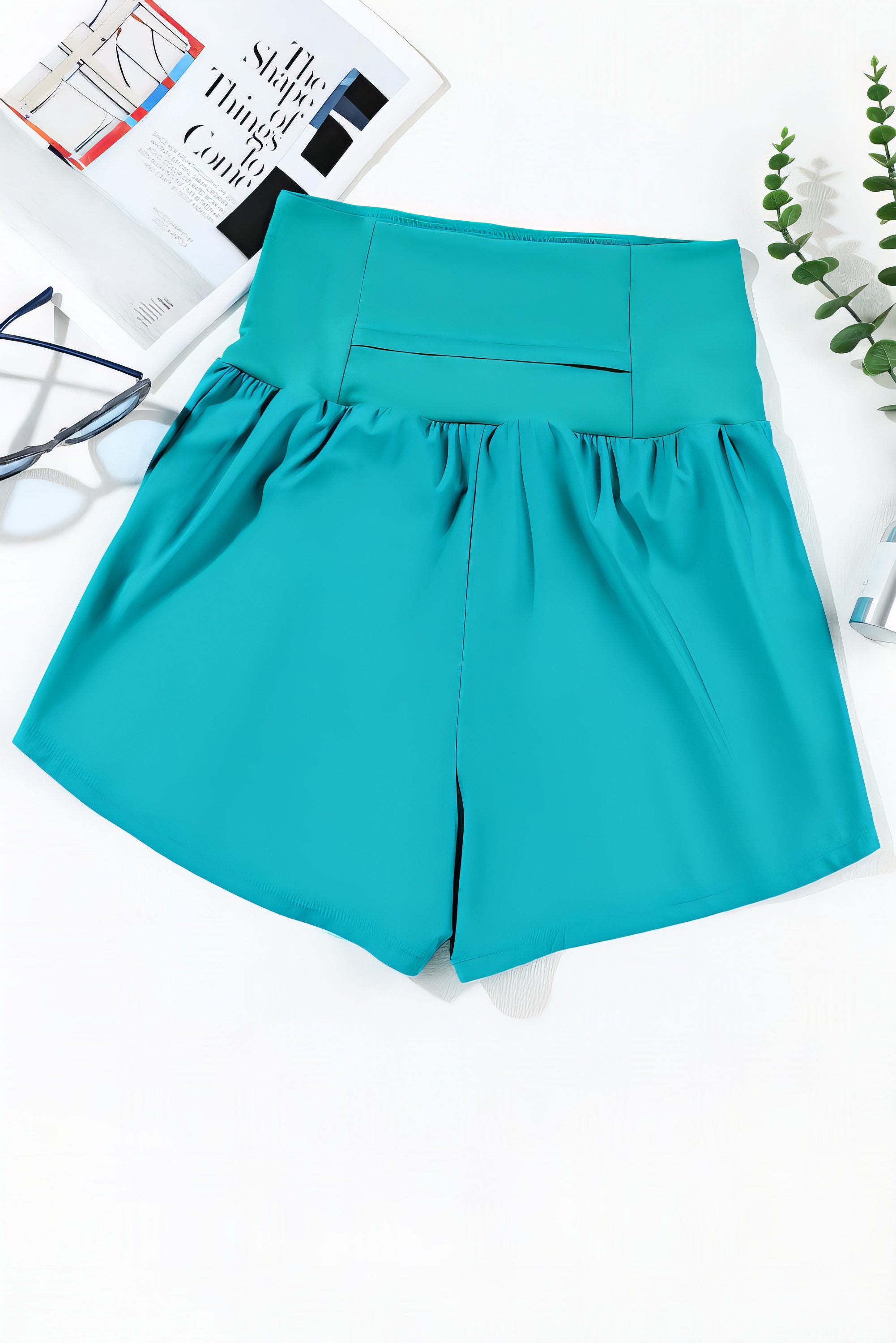 Turquoise High Waist Swim Shorts with Pockets. Stretchy, secure fit. Perfect for swimming, running, or relaxing. Phone fits in pocket.