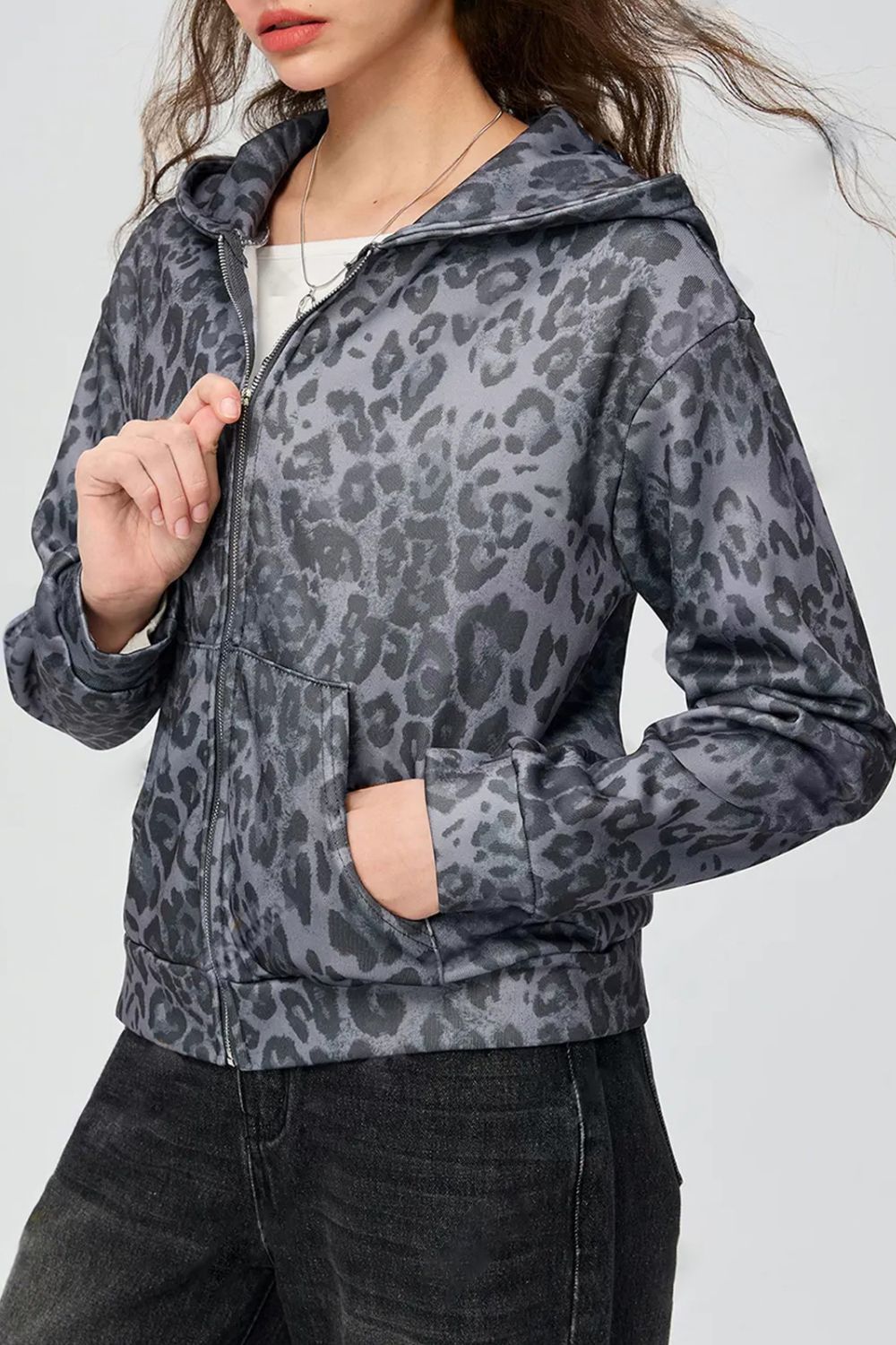 Pocketed leopard print zip up hooded jacket.