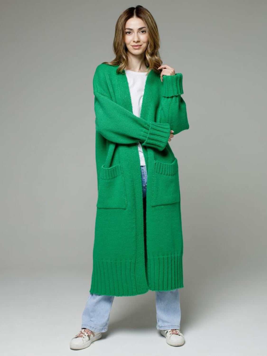 Pocketed open front dropped shoulder cardigan.