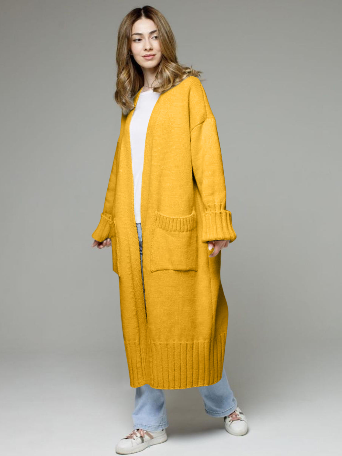 Pocketed open front dropped shoulder cardigan.