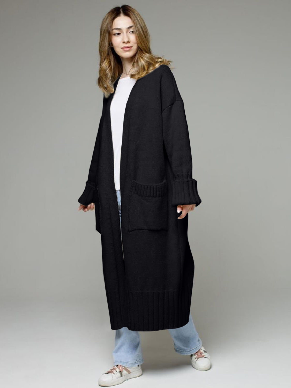 Pocketed open front dropped shoulder cardigan.