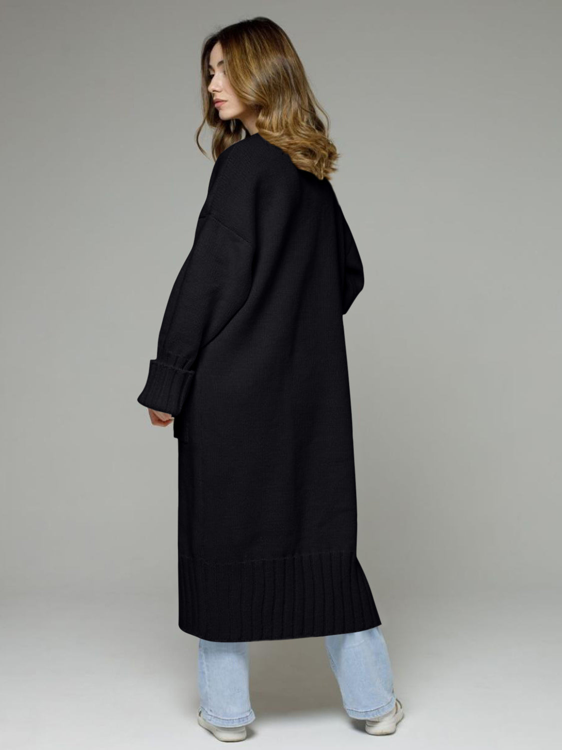 Pocketed open front dropped shoulder cardigan.