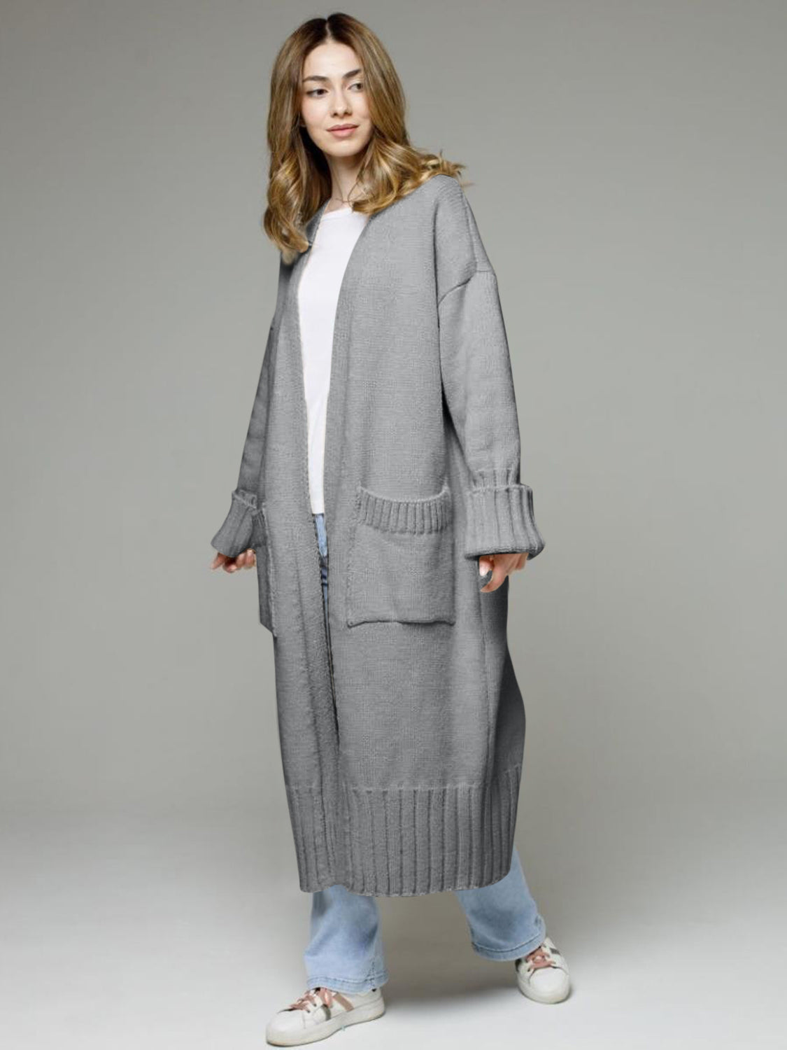Pocketed open front dropped shoulder cardigan.
