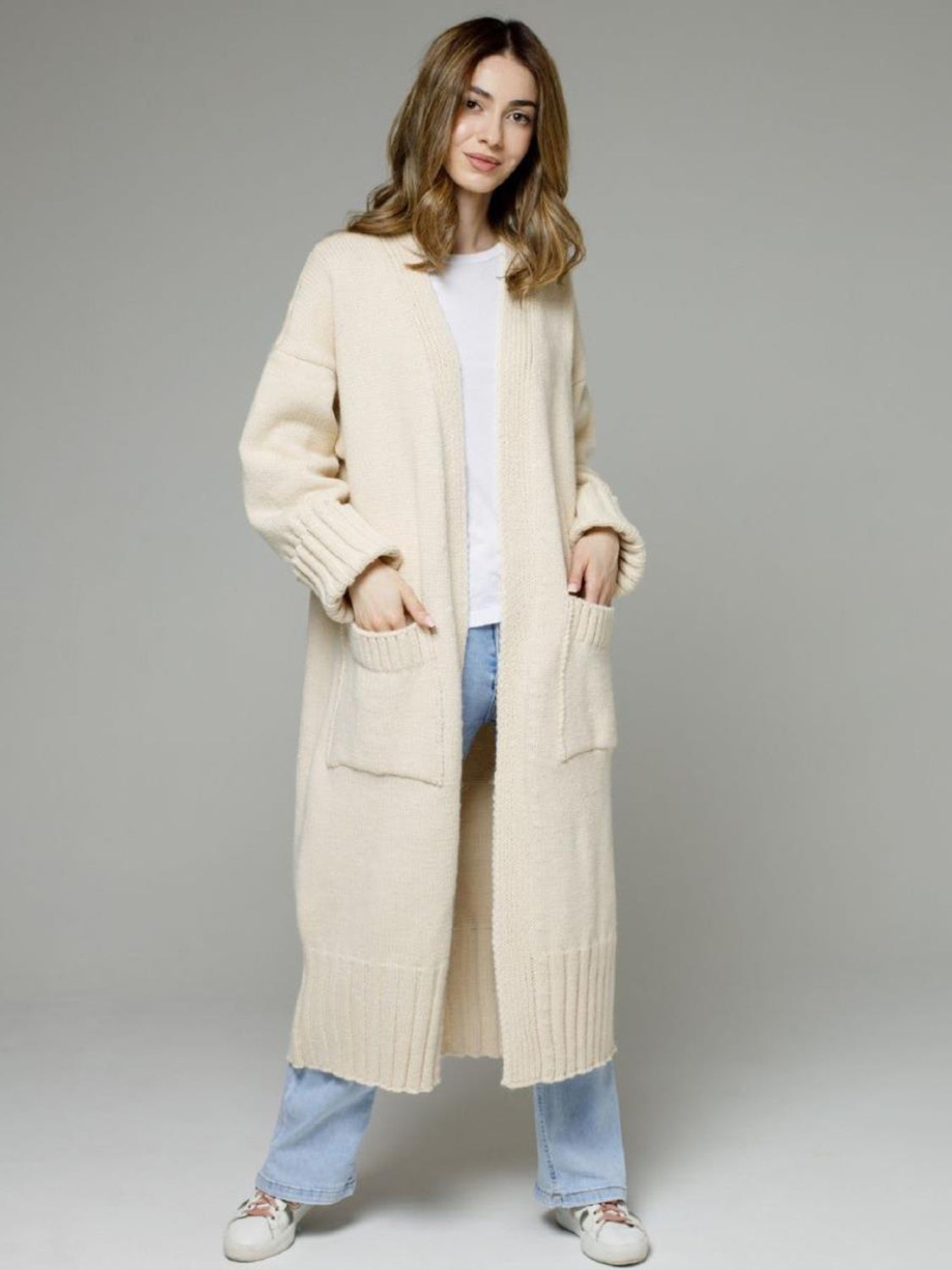 Pocketed open front dropped shoulder cardigan.
