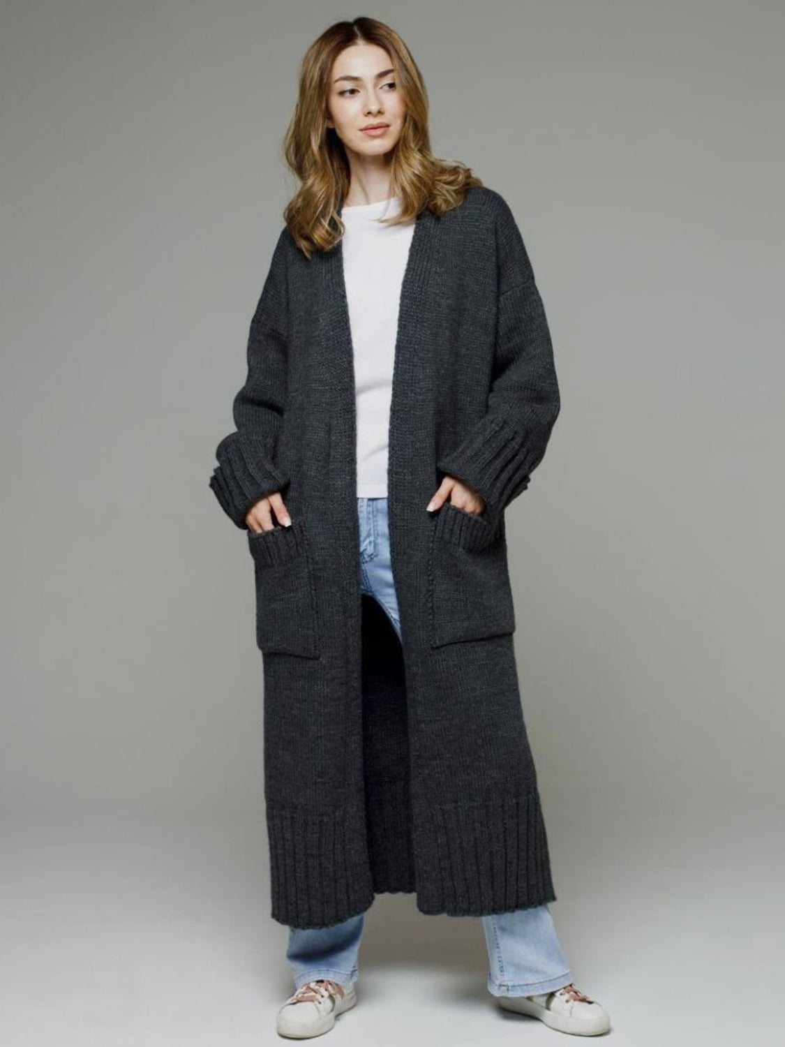 Pocketed open front dropped shoulder cardigan.