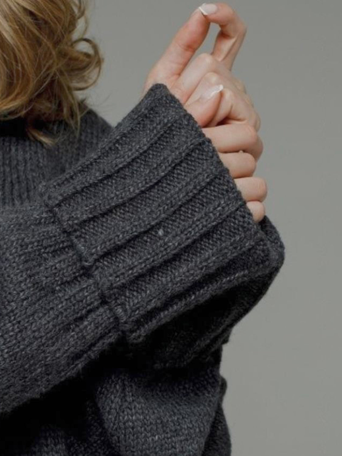 Pocketed open front dropped shoulder cardigan.