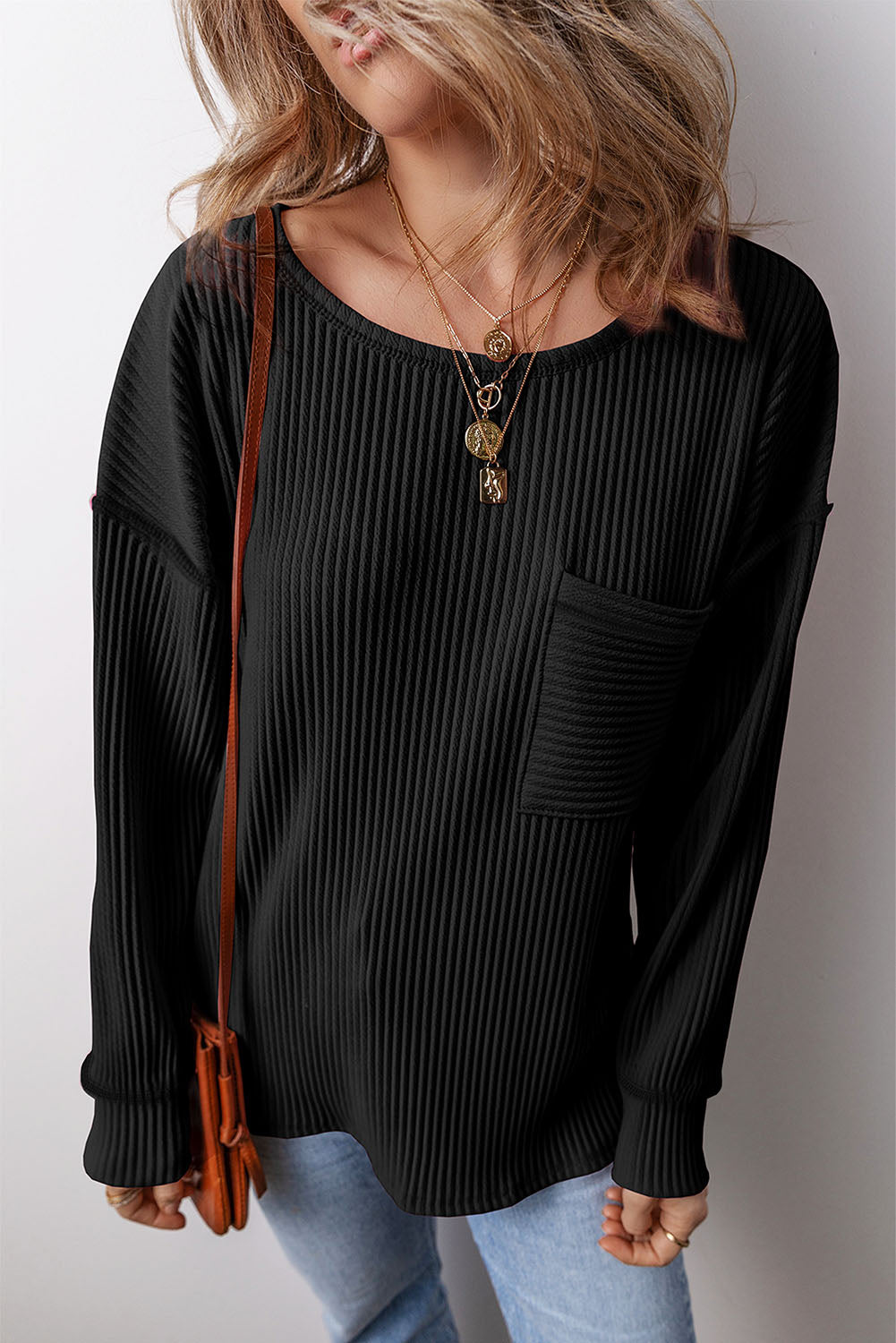 Pocketed Round Neck Long Sleeve Top.