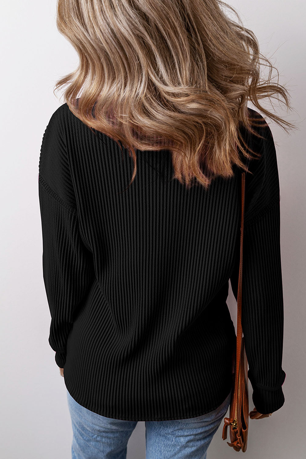 Pocketed Round Neck Long Sleeve Top.