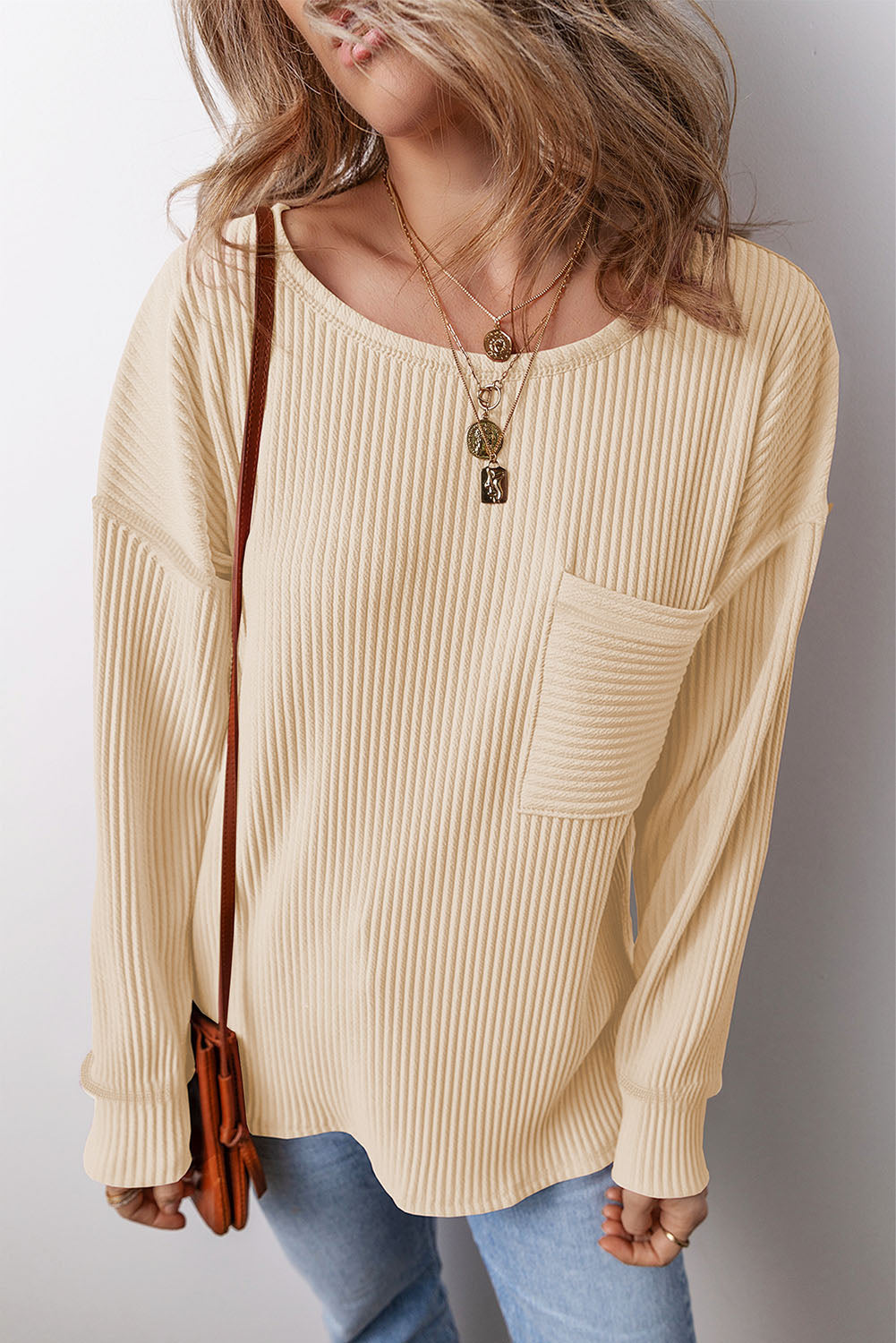 Pocketed Round Neck Long Sleeve Top.