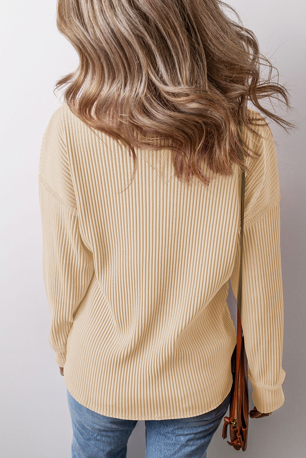 Pocketed Round Neck Long Sleeve Top.