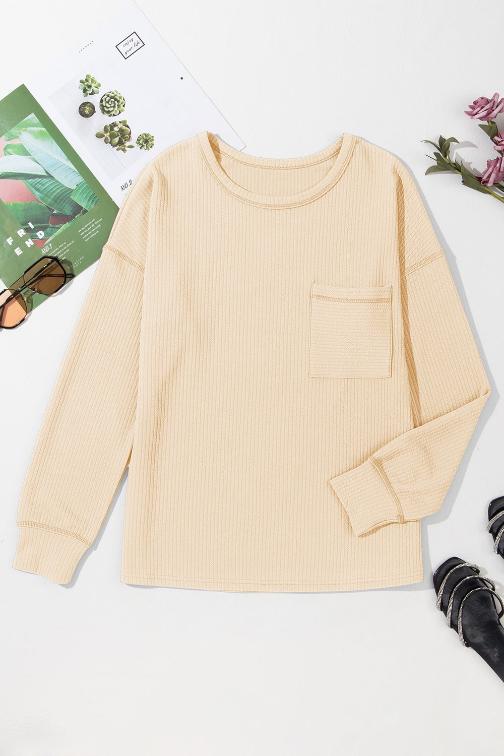 Pocketed Round Neck Long Sleeve Top.
