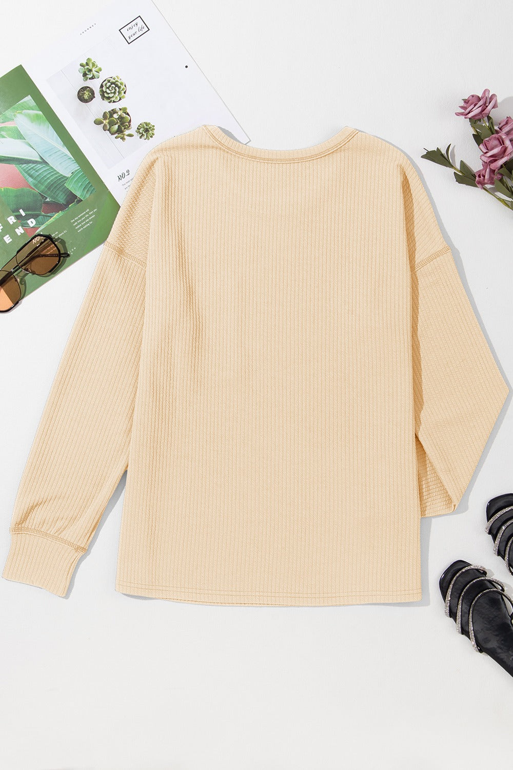 Pocketed Round Neck Long Sleeve Top.