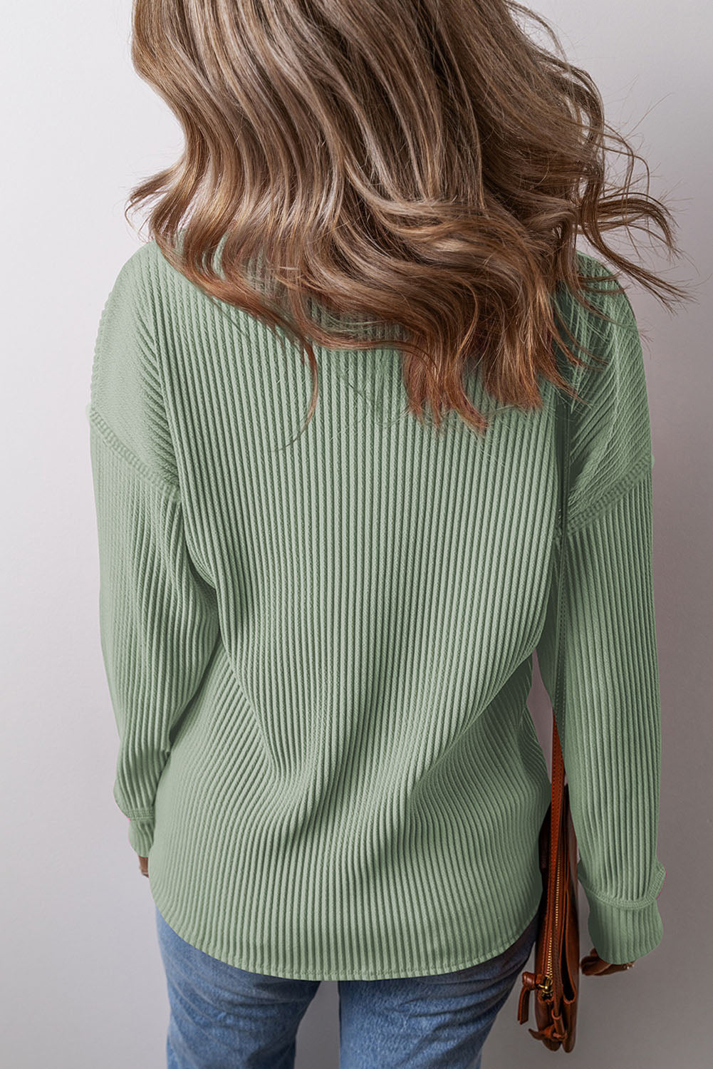 Pocketed Round Neck Long Sleeve Top.