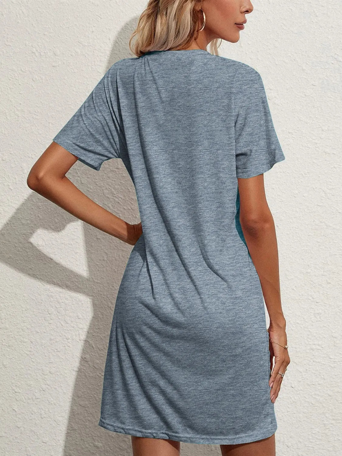 Pocketed Round Neck Short Sleeve Mini Tee Dress.