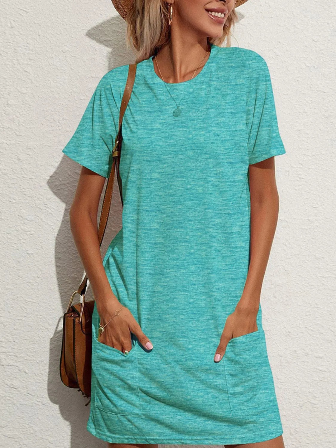 Pocketed Round Neck Short Sleeve Mini Tee Dress.