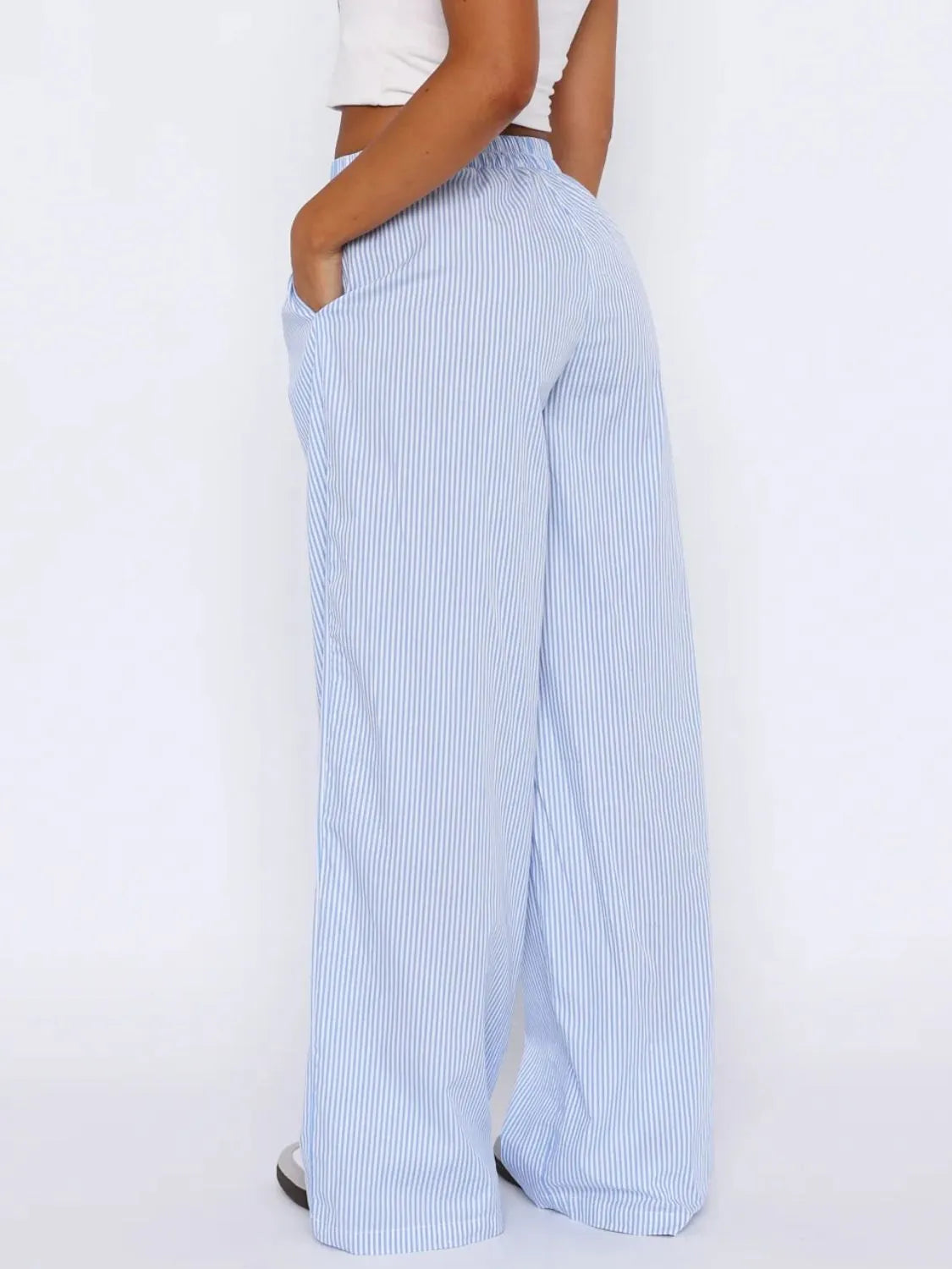 Pocketed striped wide leg pants.