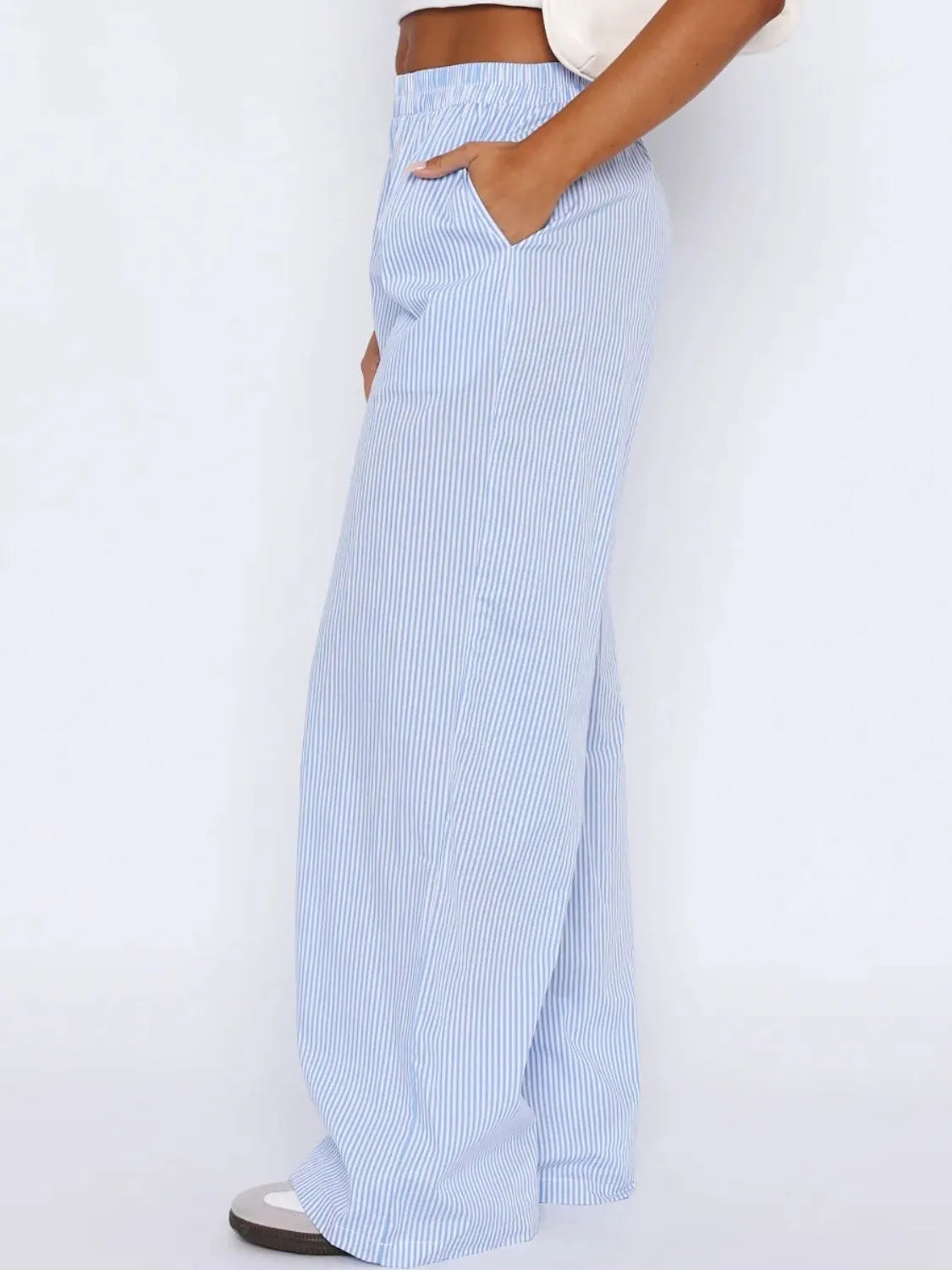 Pocketed striped wide leg pants.
