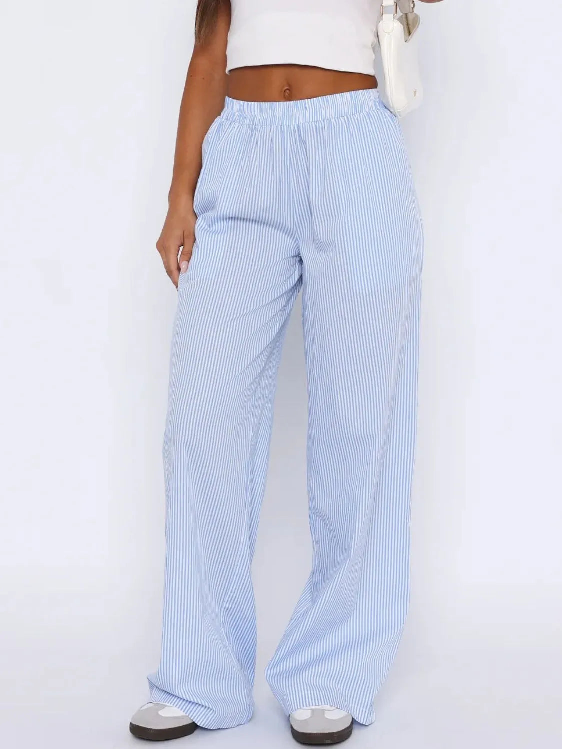 Pocketed striped wide leg pants.