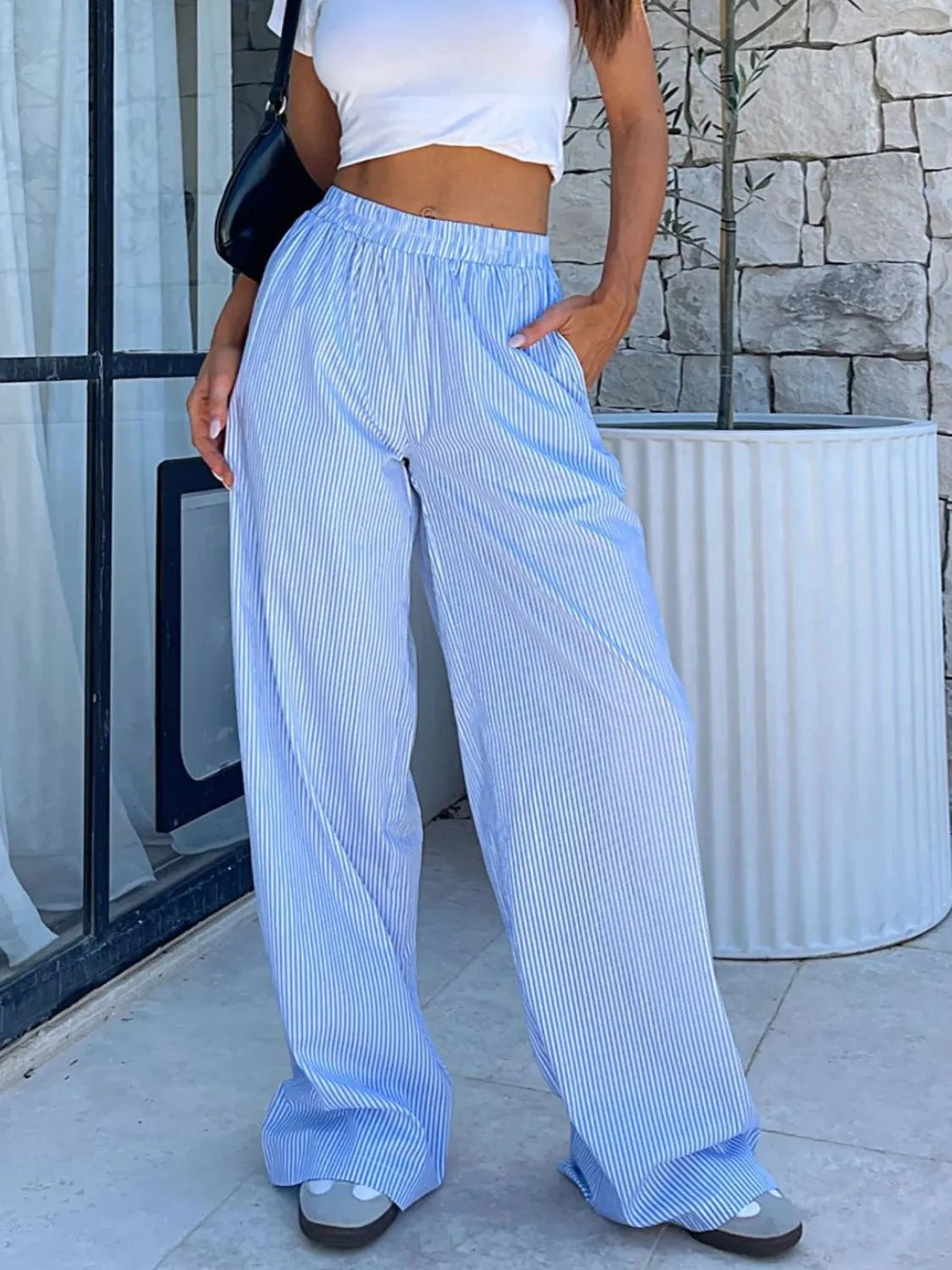 Pocketed striped wide leg pants.