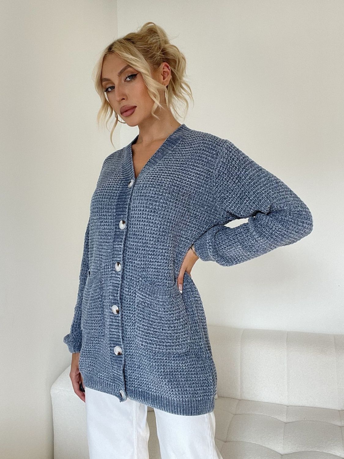 Pocketed V-neck button up cardigan.