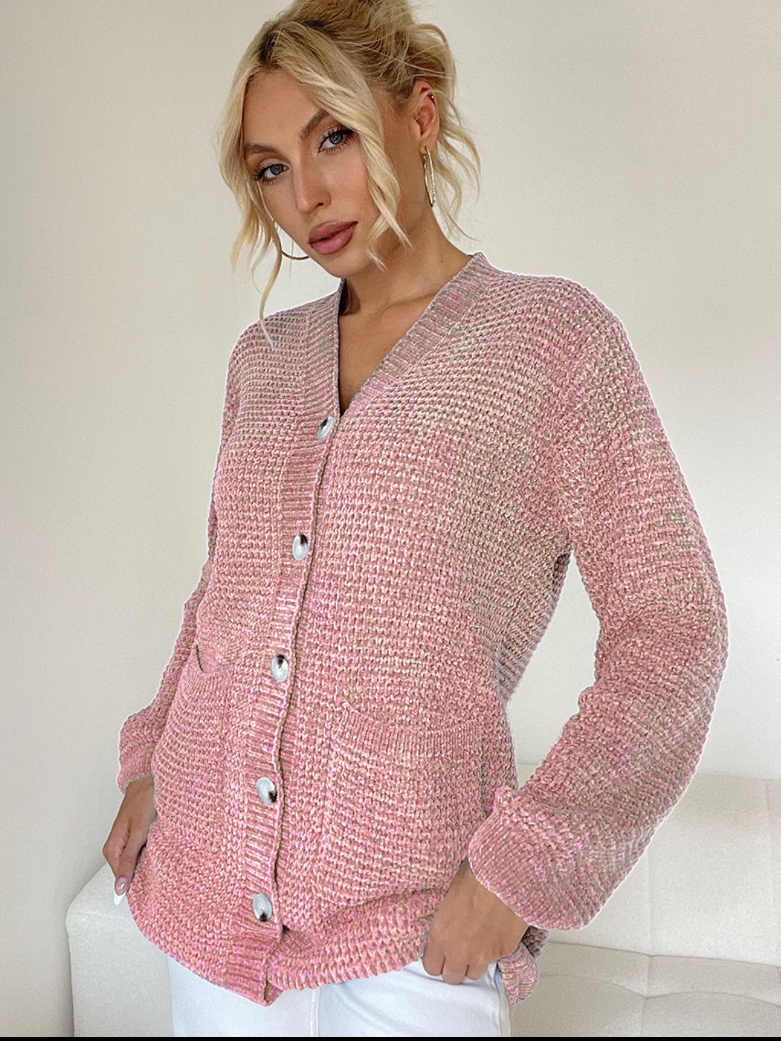 Pocketed V-neck button up cardigan.