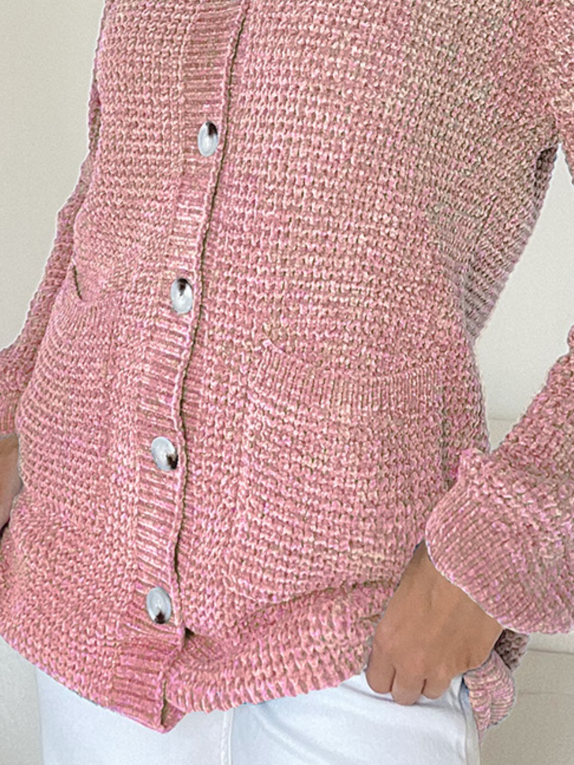 Pocketed V-neck button up cardigan.