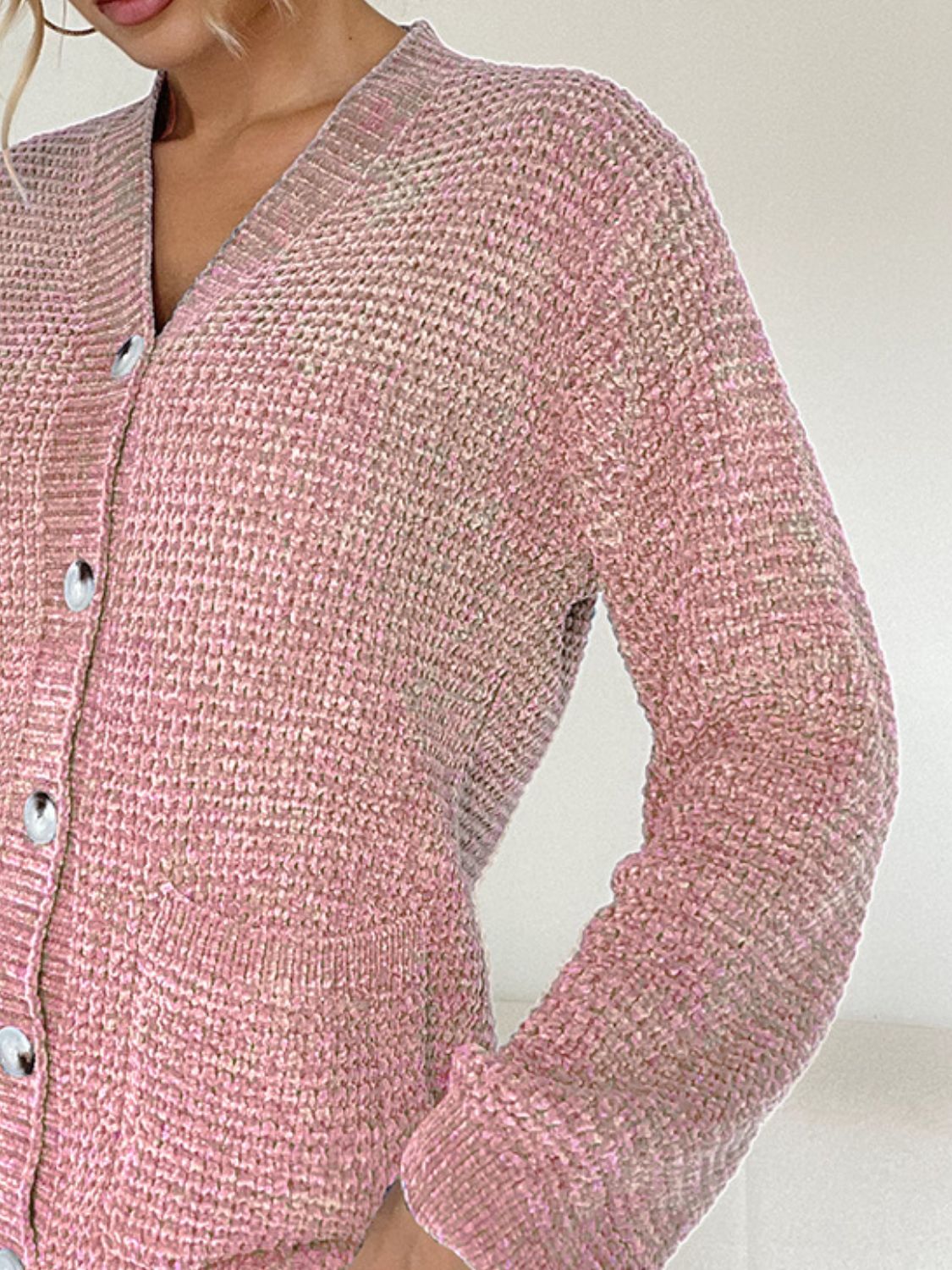 Pocketed V-neck button up cardigan.