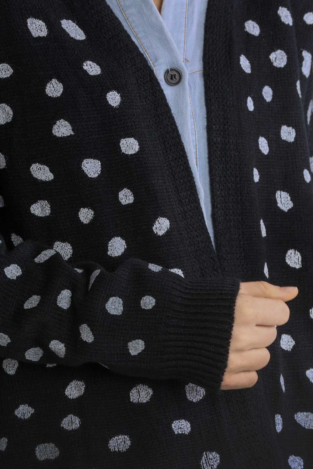 Polka dot open front drop shoulder cardigan with ribbed details.